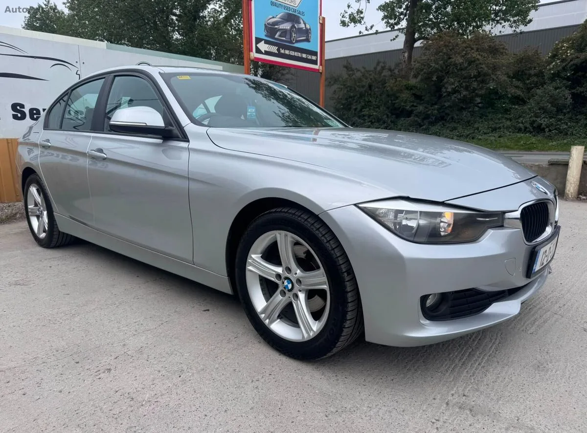 2012 BMW 3-Series – photo 1