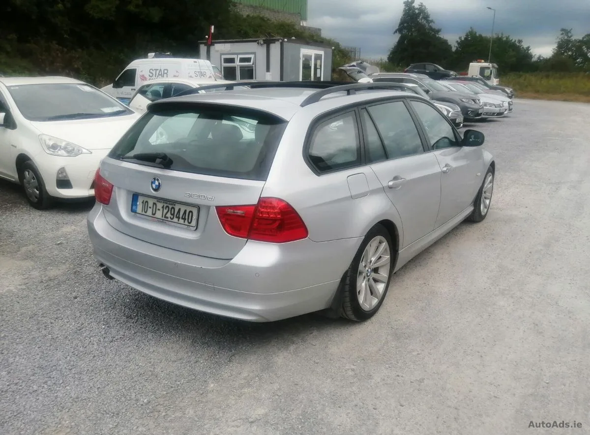 2010 BMW 3-Series – photo 3