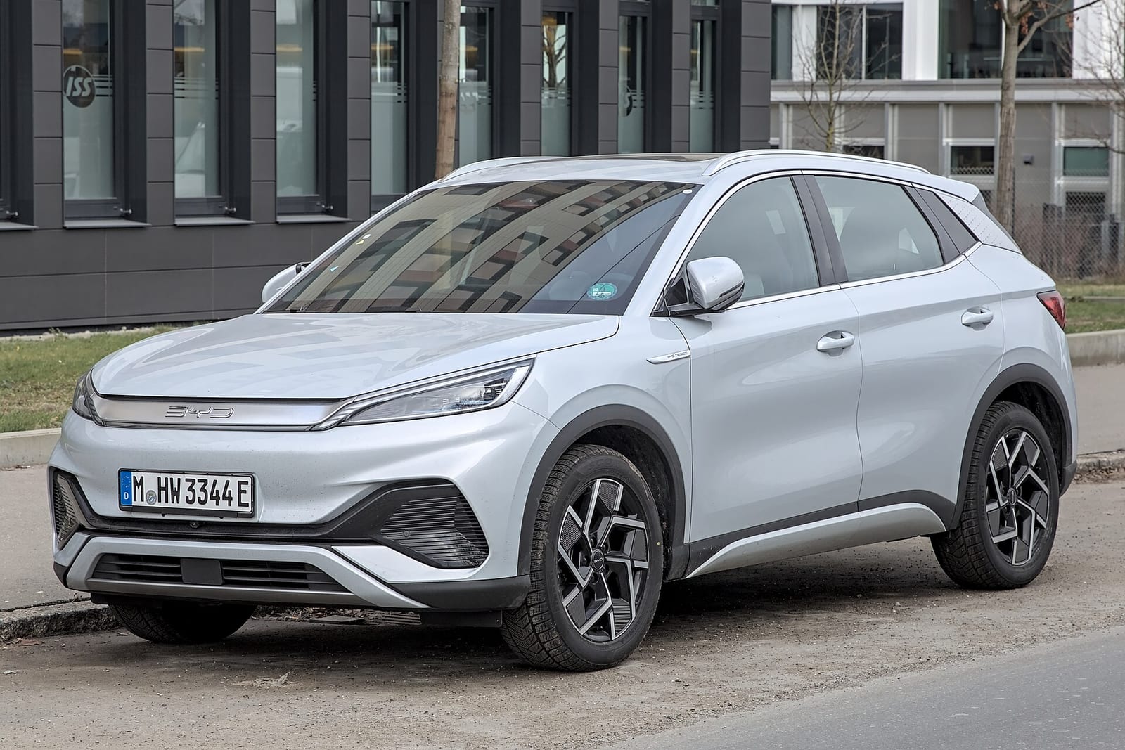 Customers viewing Chinese-brand cars on an Irish dealership forecourt.