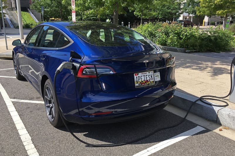 Electric private hire car at a city rank